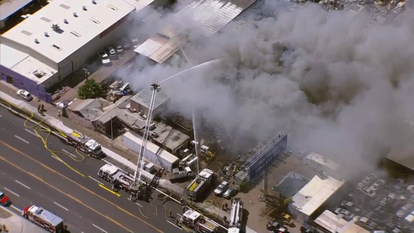 Phoenix fire crews battling a 1st alarm junkyard fire 3TV CBS 5
