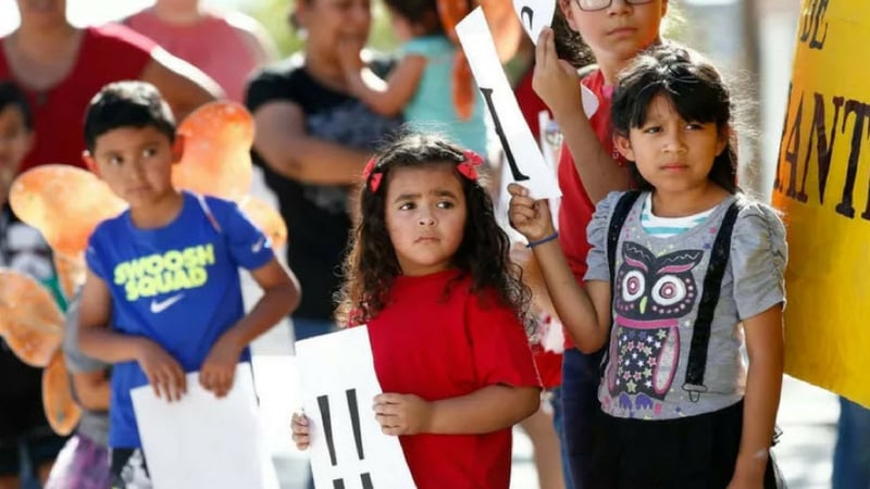 Image result for Children listen to speakers during an immigration family separation protest in Phoenix, Arizona. (AP Photo/Ross D. Franklin)