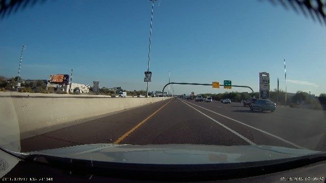 DASH CAM VIDEO: Woman swerves to avoid a wrong-way driver in Chandler