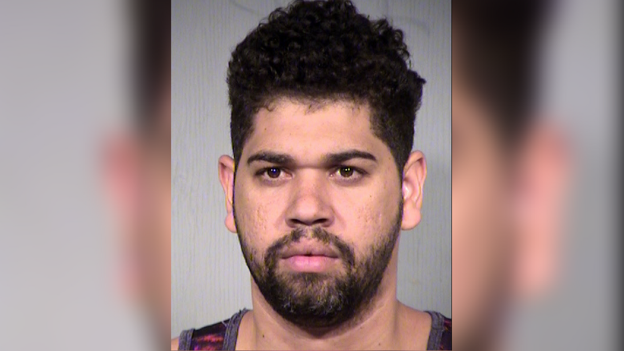 Police arrest employee at Phoenix migrant holding facility for sex abuse of 14-year-old